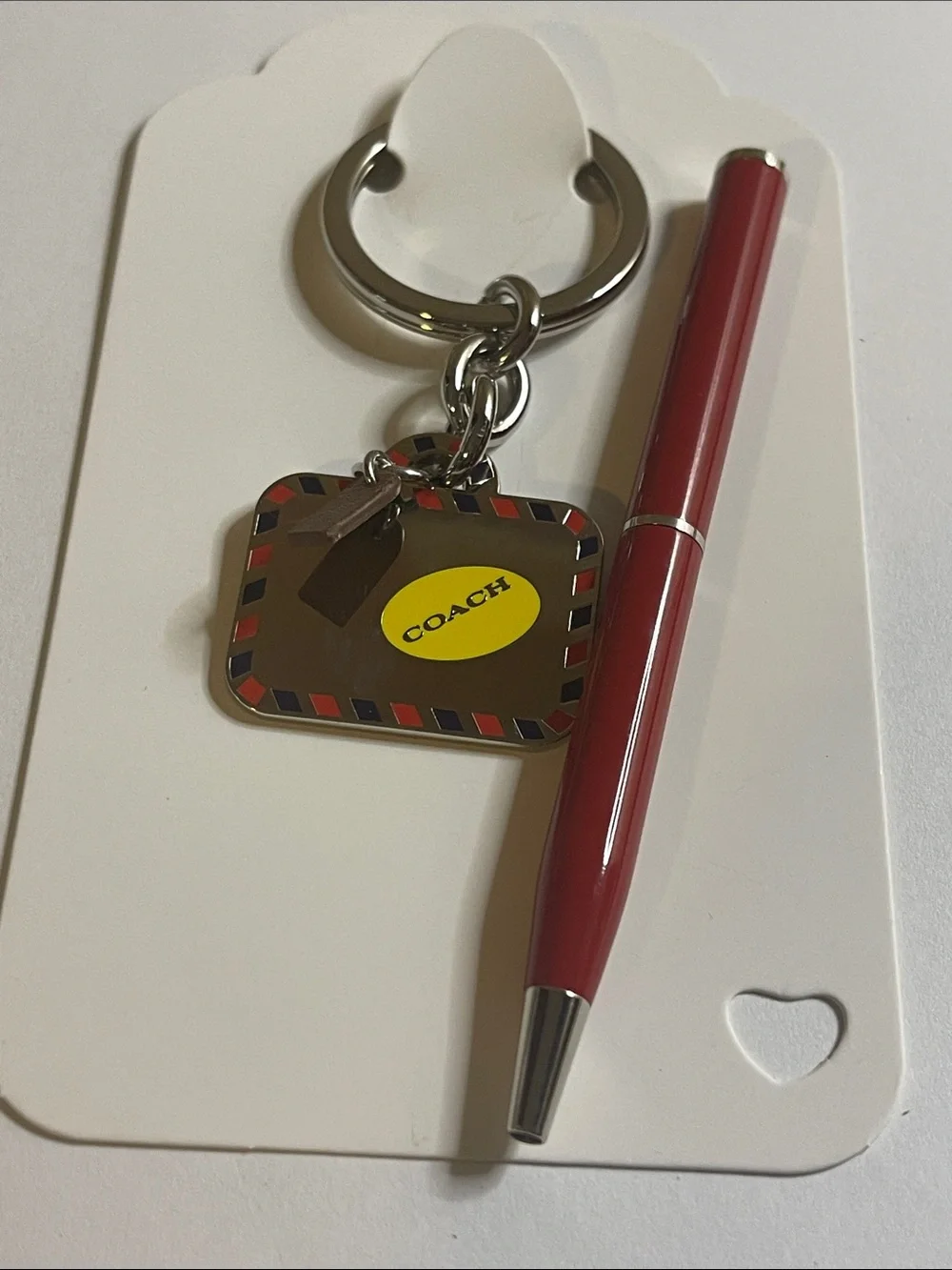 COACH Silver Bag Keychain and Coach Pen